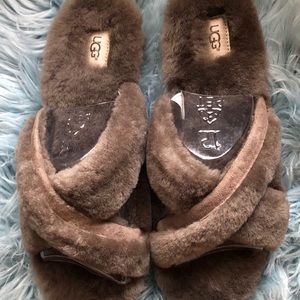 Ugg Abela Slippers Chocolate Brown in color.